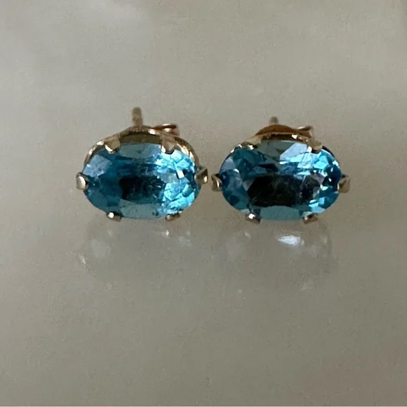 14k Solid Gold Blue Topaz Oval Post Earrings - Picture 1 of 13